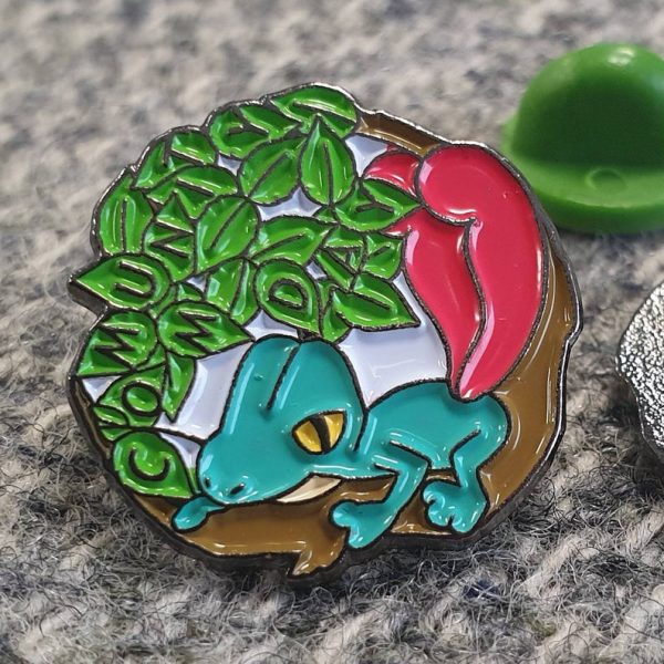 The shiny version of the Treecko enamel pin for March 2019