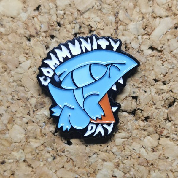 The normal version of the June 2021 Community Day pin featuring Gible